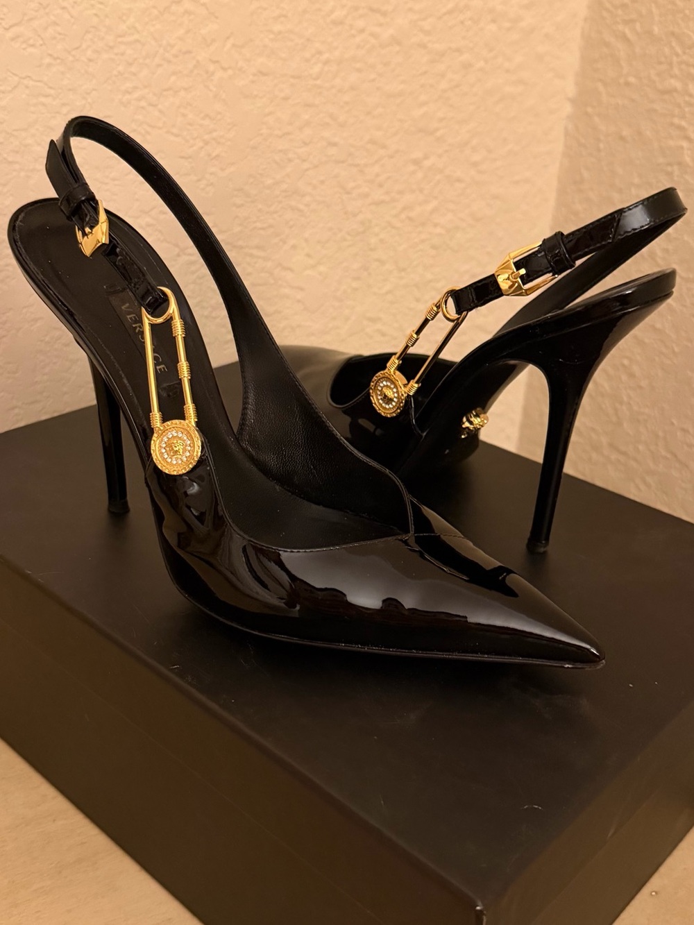 Versace Black Patent Slingback Pumps with Gold Medallion